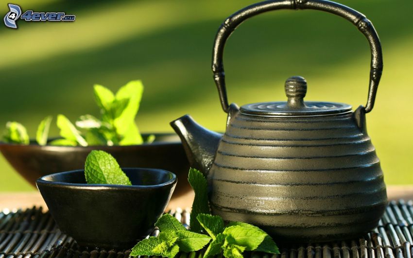 teapot, cup of tea, mint leaves