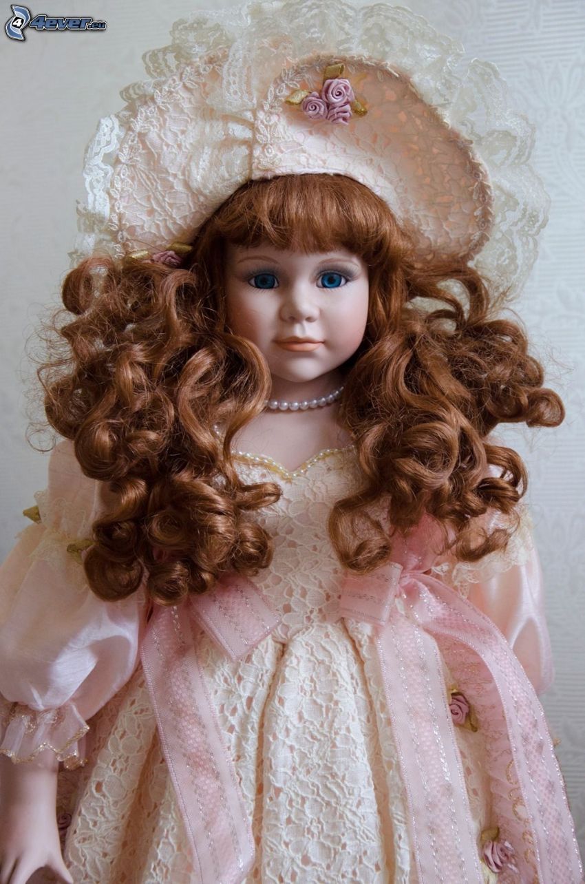 porcelain doll, pink dress, curly hair
