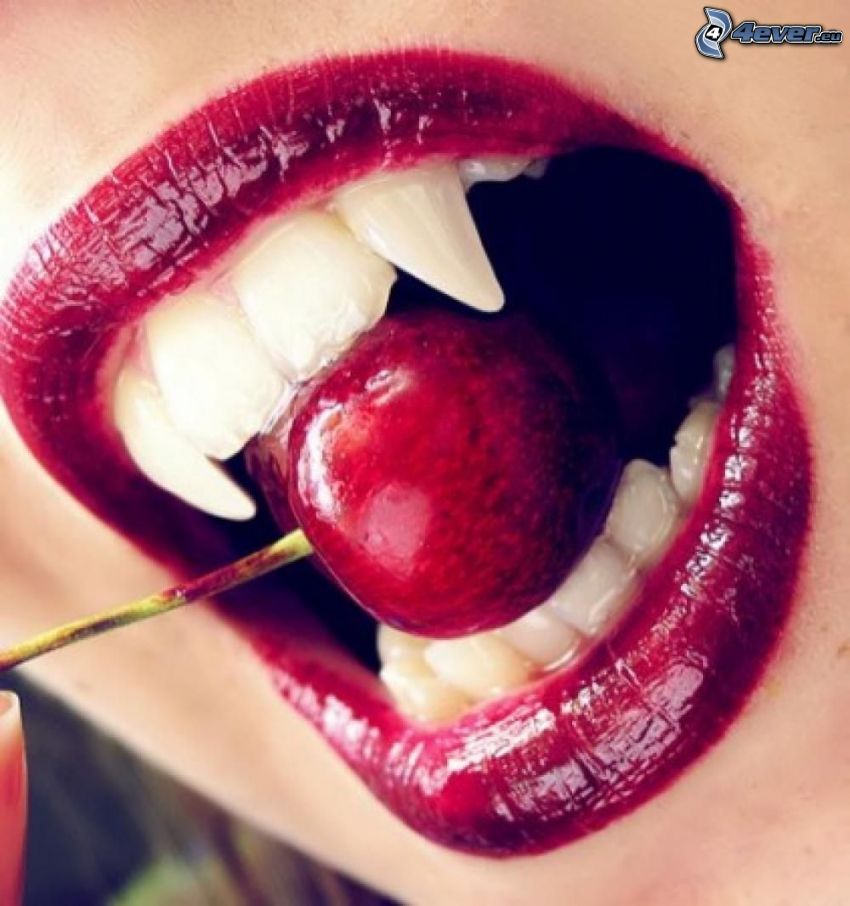 red lips, fangs, black cherry