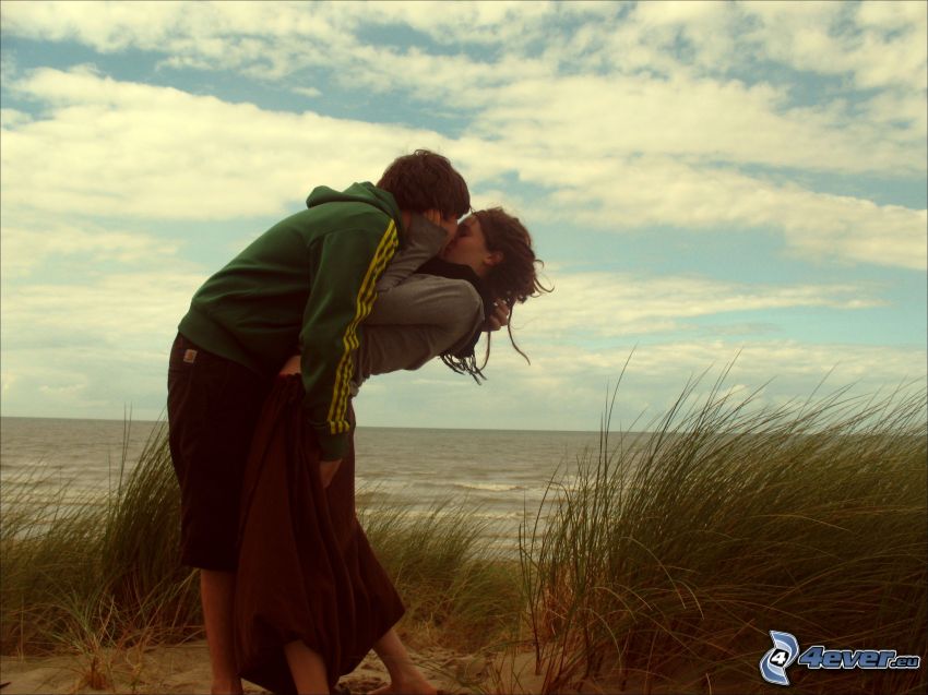 couple by the sea, kiss