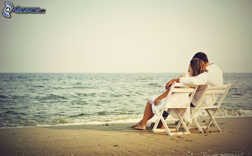 couple by the sea, open sea, chairs