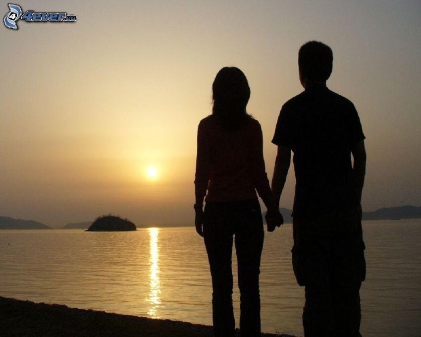 silhouette of couple, park at sunset, sunset at sea