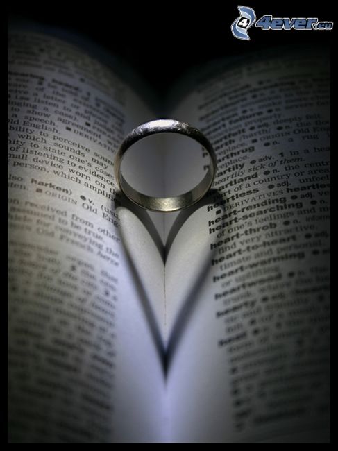 Ring on book, heart in the book, shadow