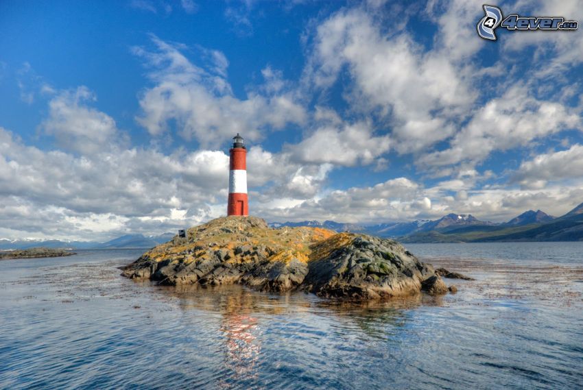 lighthouse on the island, sea, clouds