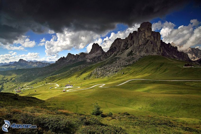 Dolomites, rocky mountain, dark clouds, road