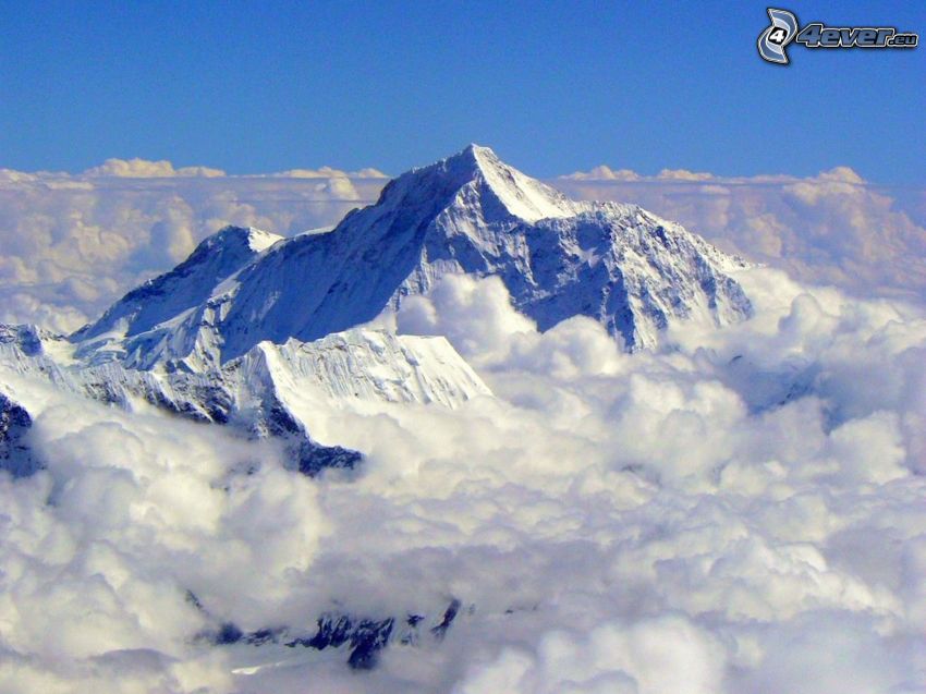 Mount Everest, over the clouds, snowy hill