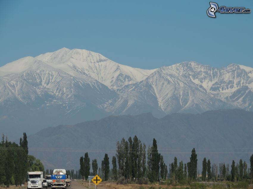 snowy mountains, camions, road