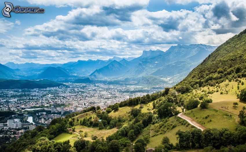 view of the city, mountains