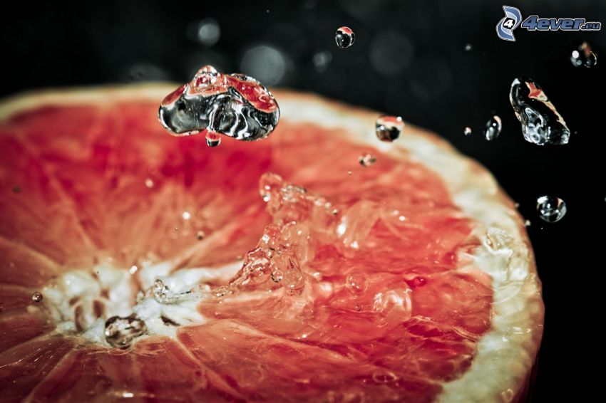 grapefruit, drops of water