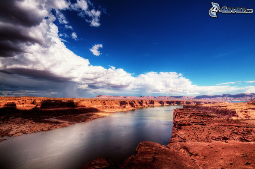 River, desert rocks, clouds