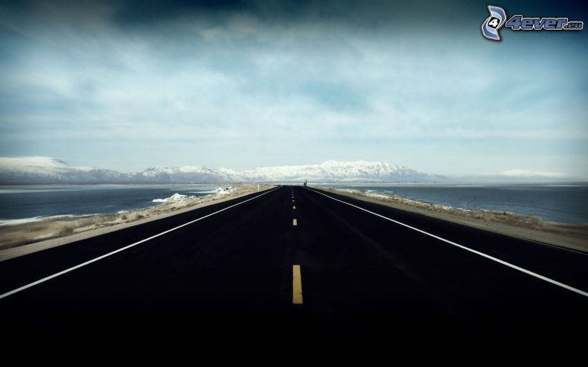 road, sea, snowy hills