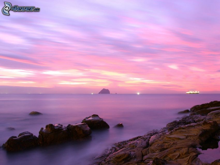 sea, rocky coastline, purple sky