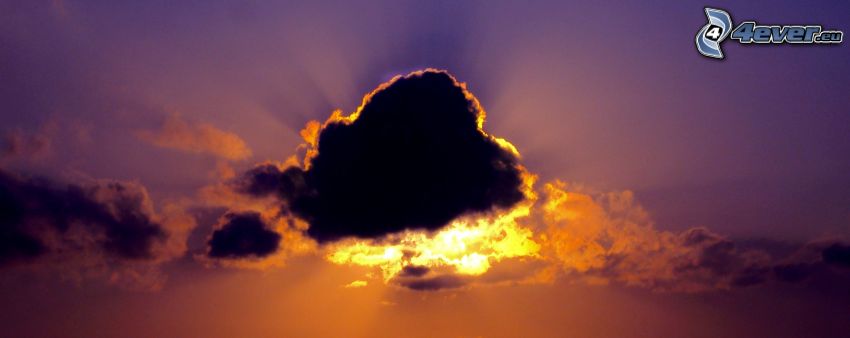 sunbeams behind clouds
