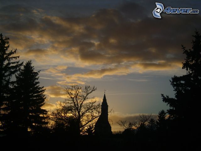 the silhouette of the church, silhouettes of the trees, clouds