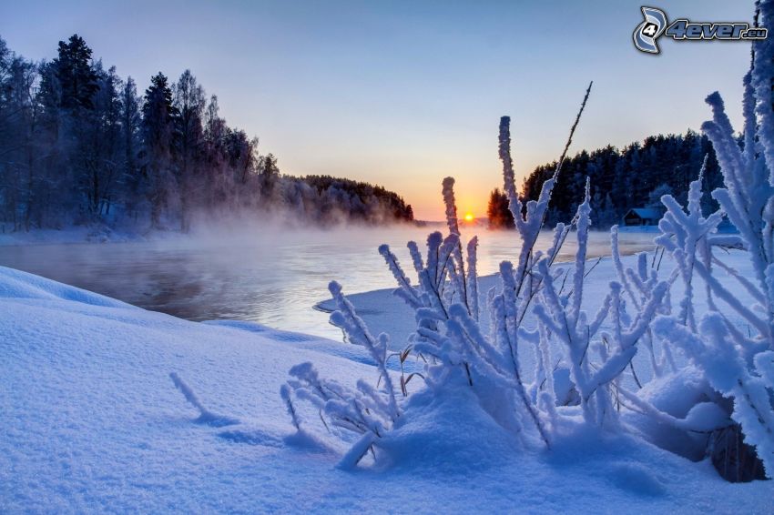 sunset over the river, snowy landscape