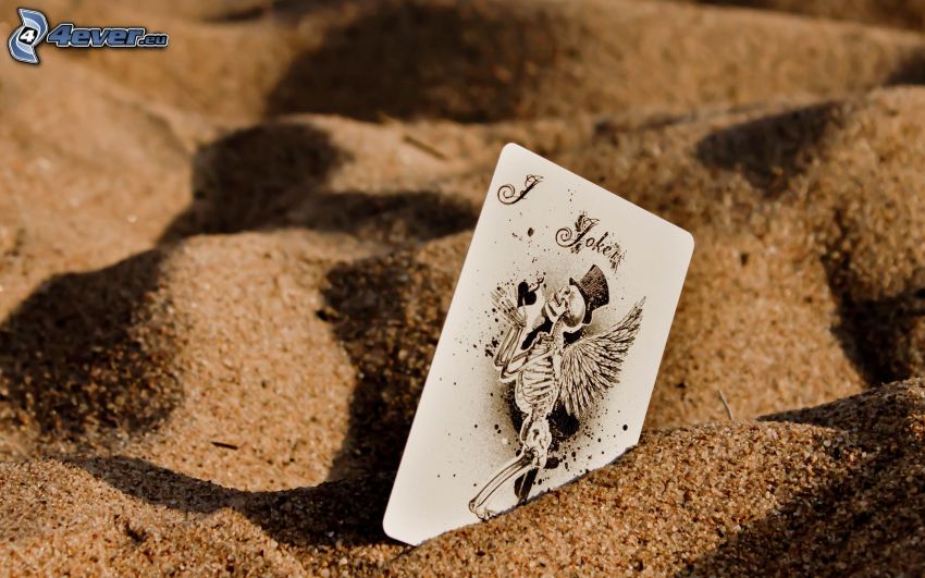 card in the sand, skeleton