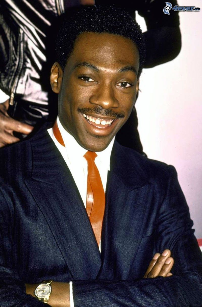 Eddie Murphy, smile, man in suit, young