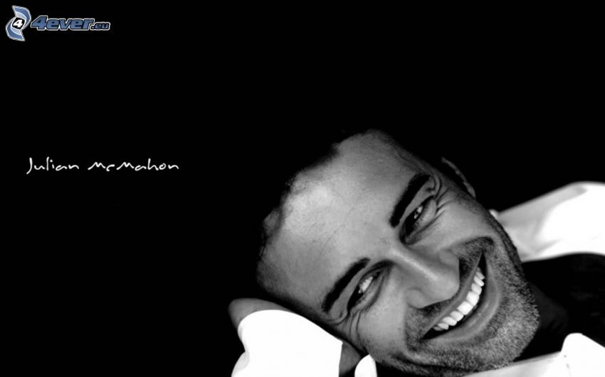Julian McMahon, smile, black and white photo