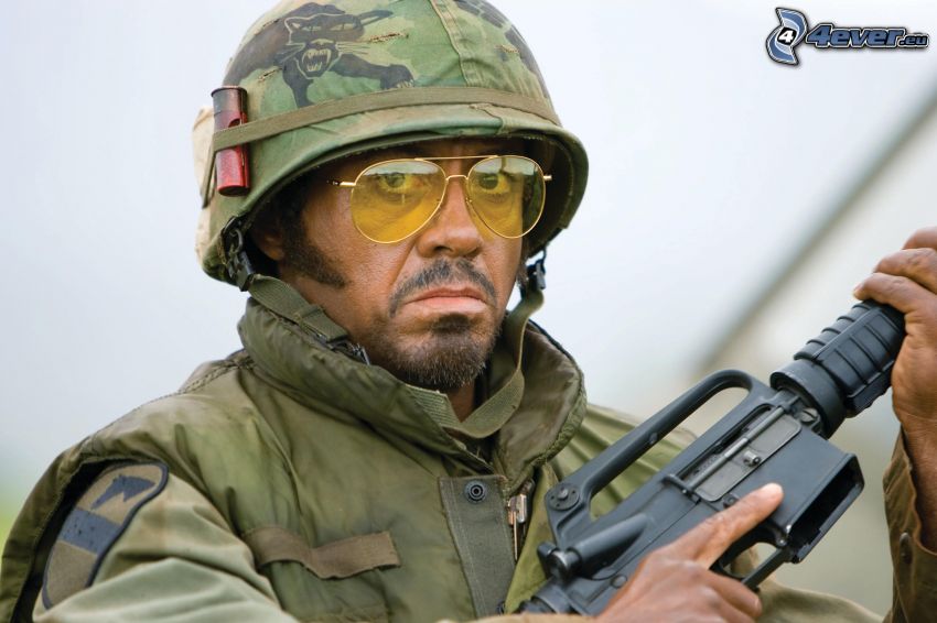 Robert Downey, soldier with a gun