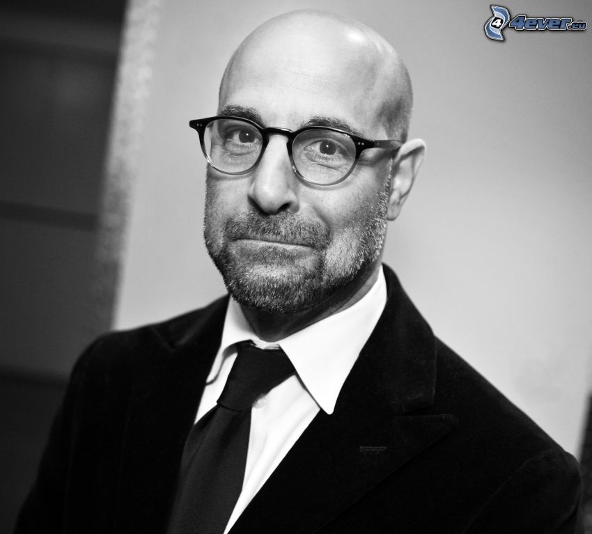 Stanley Tucci, man with glasses, man in suit, black and white photo