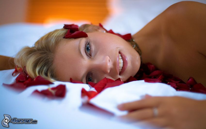 blonde in bed, rose petals