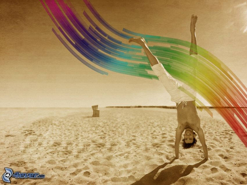 guy on the beach, handstand, rainbow colors