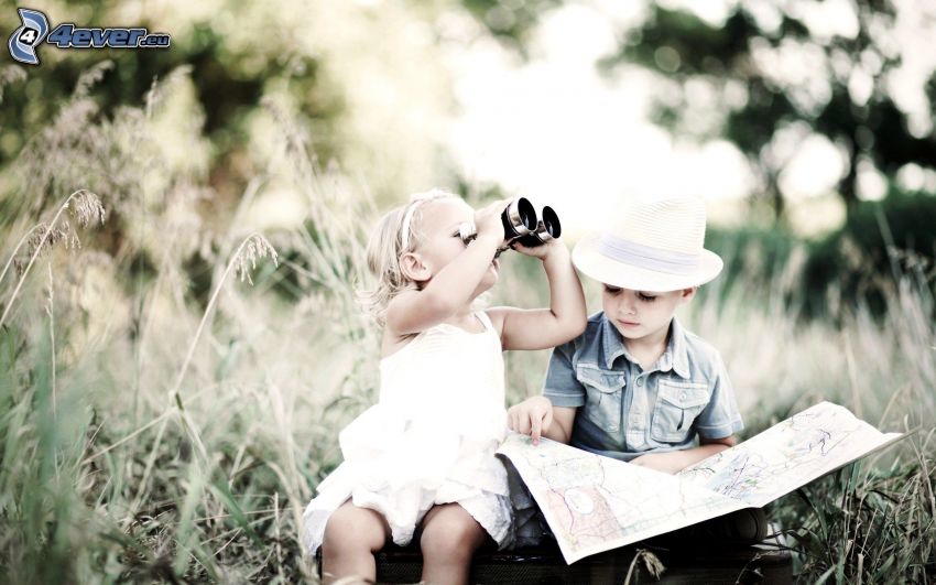 boy and girl, map, binoculars