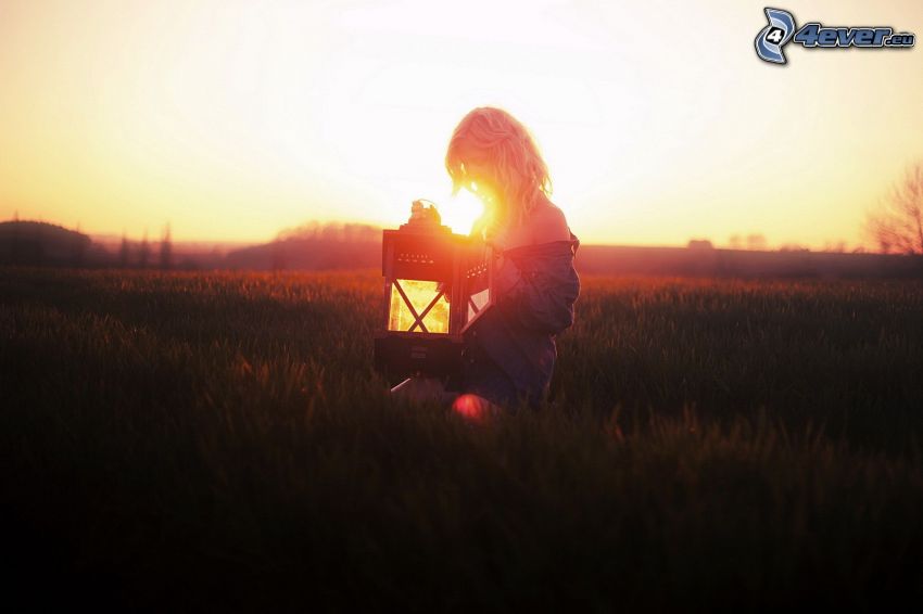 girl on the meadow, lantern, sunset in the meadow