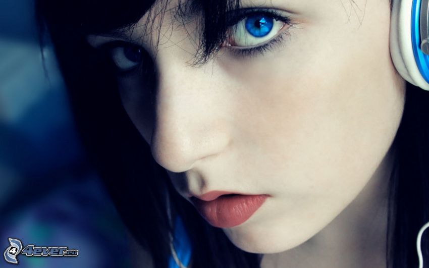 girl with headphones, blue eyes