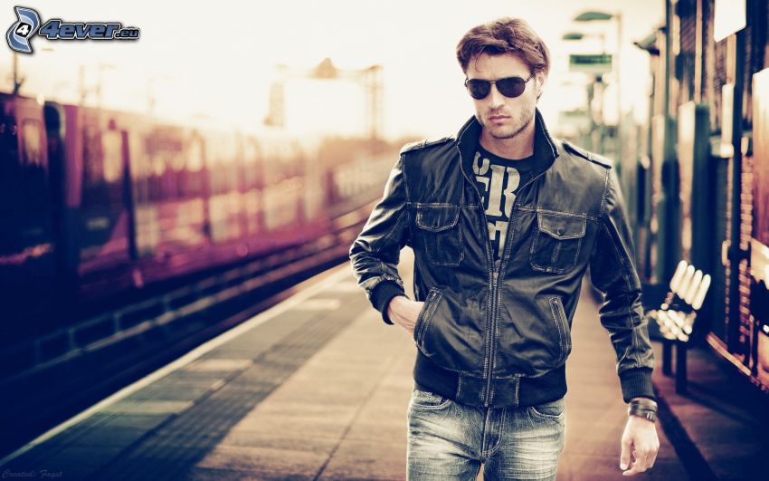 man, leather jacket, railway station