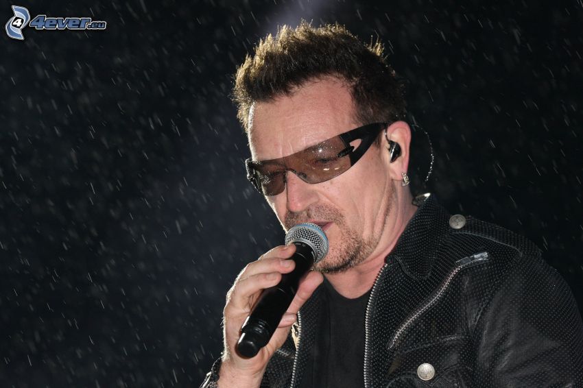 Bono Vox, man with glasses, singing