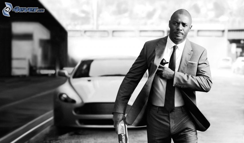 Idris Elba, man in suit, black and white photo