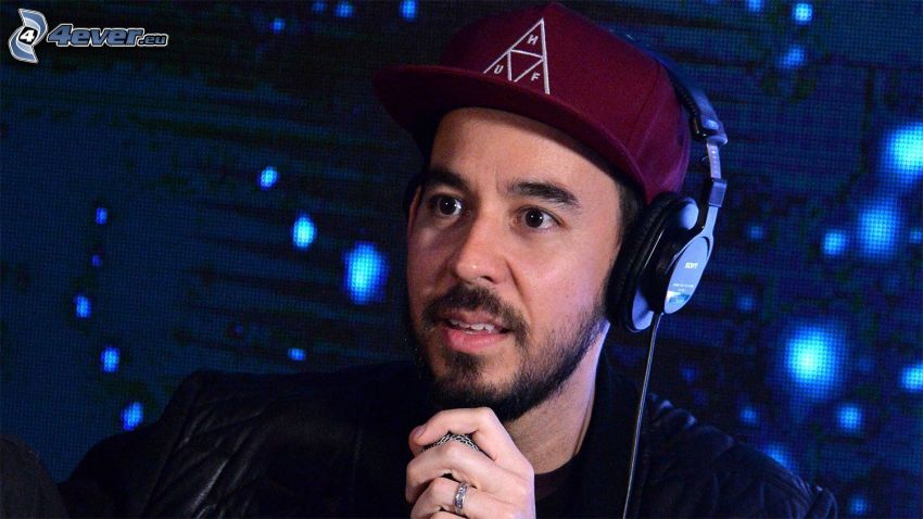 Mike Shinoda, headphones, cap