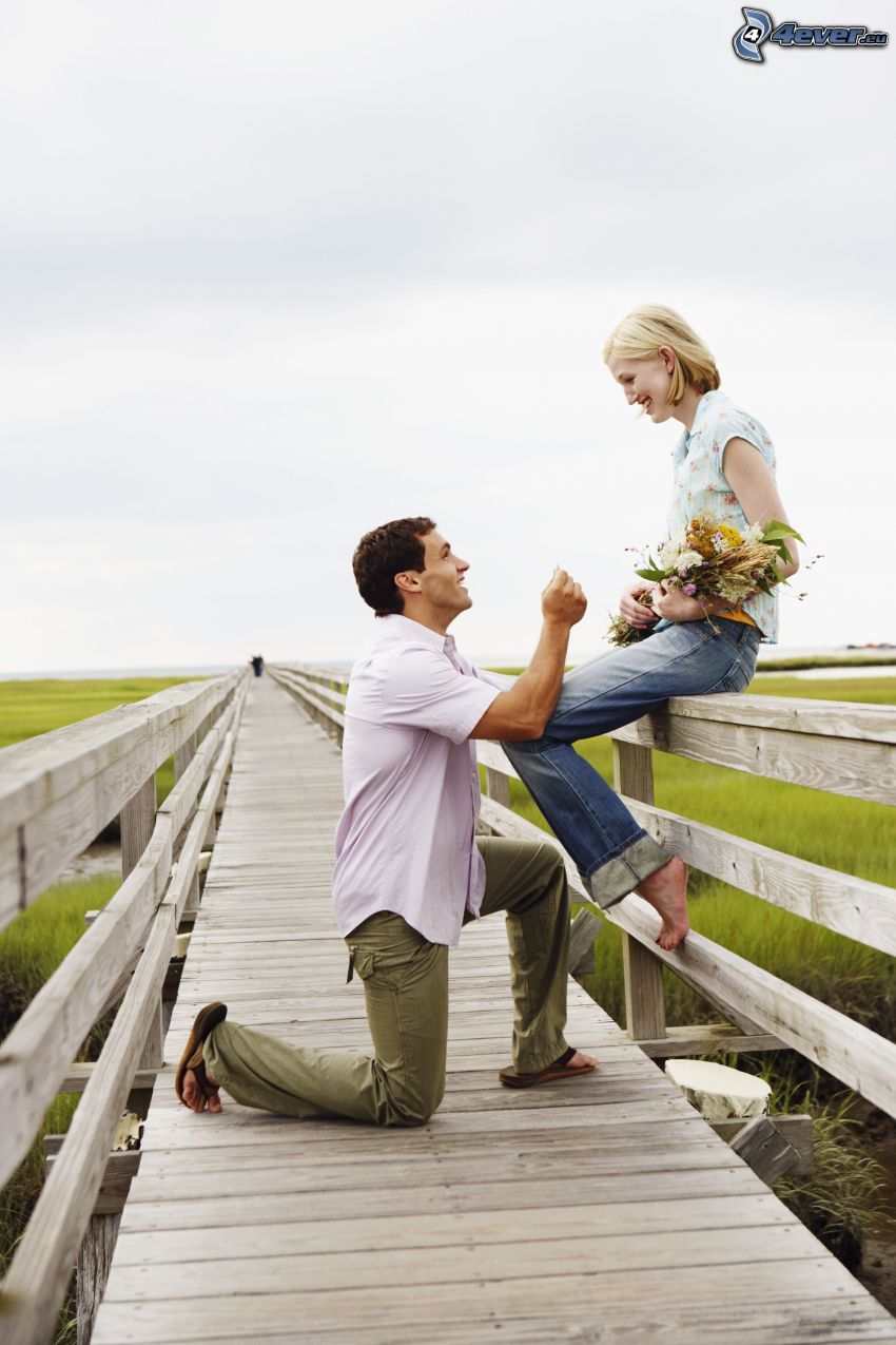 proposing, couple, wooden pier, bouquets