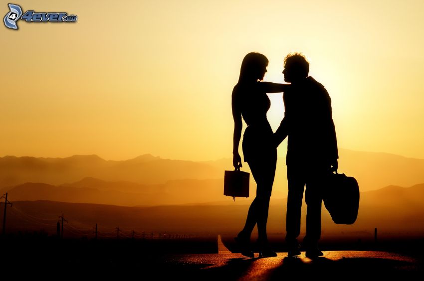 silhouette of couple, couple at sunset, mountain