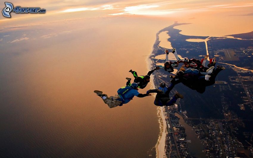 skydivers, coastal city