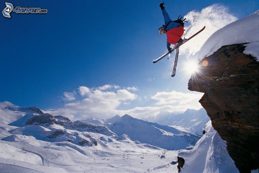 extreme skiing, jumping on the ski, snow, sun, snowy hills