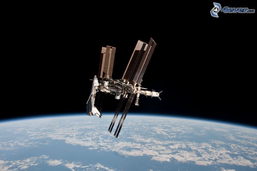 Endeavour attached to the ISS, ISS over Earth